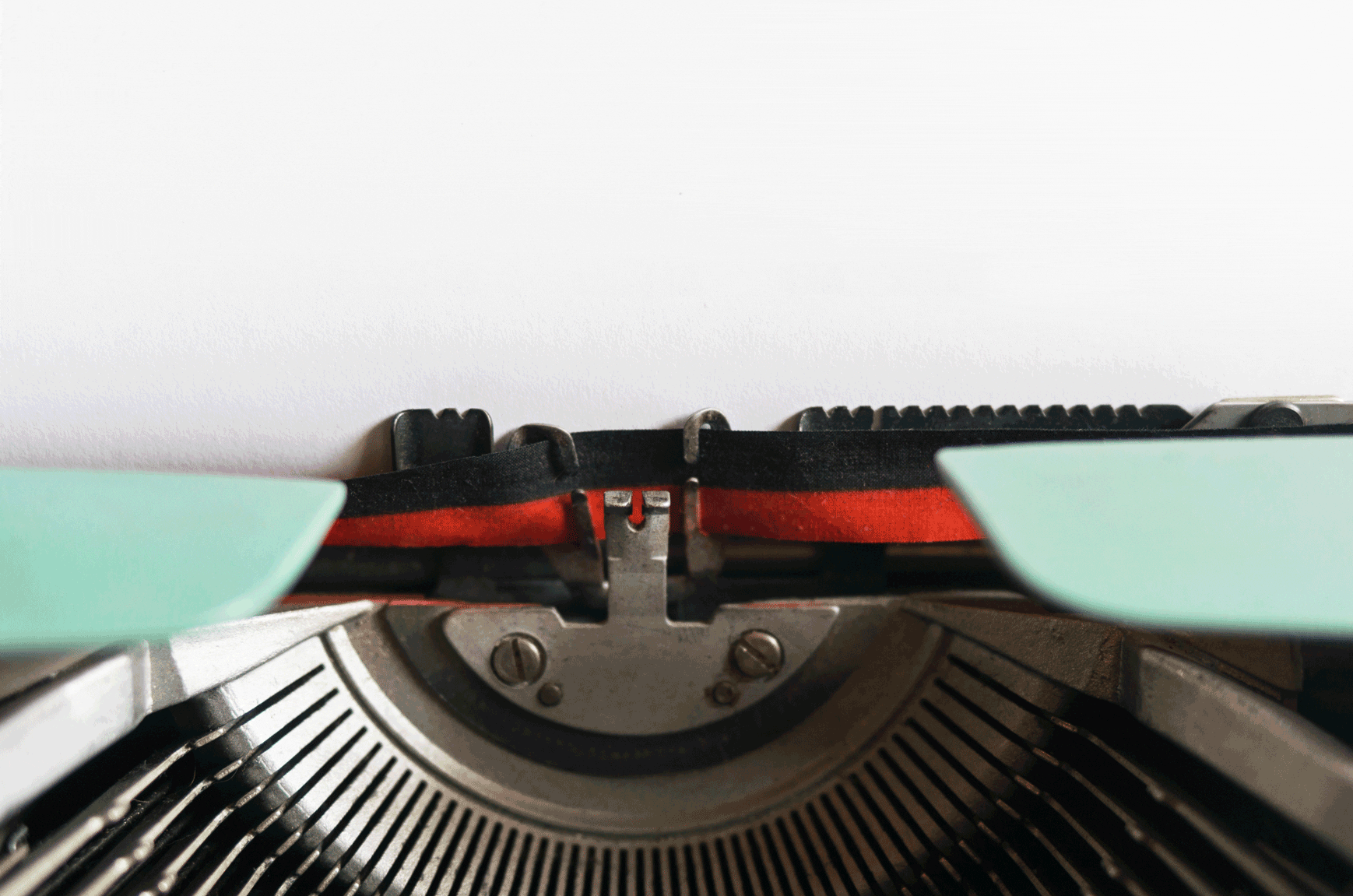 The word "No" appears on a piece of paper in a typewriter in this gif.